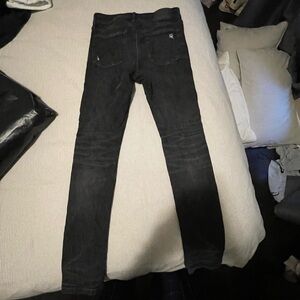 black ripped skinny jeans